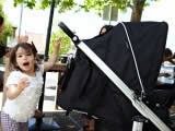 Lifestyle image of girl with Ion Pram